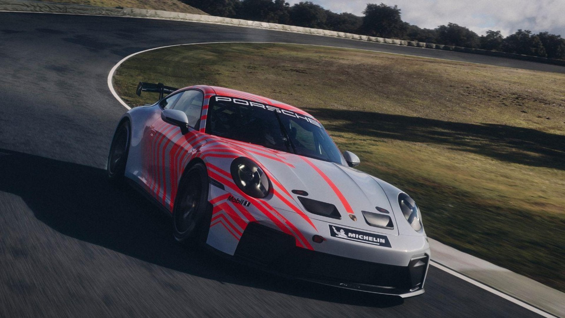 Porsche 911 Challenge cornering on a racetrack